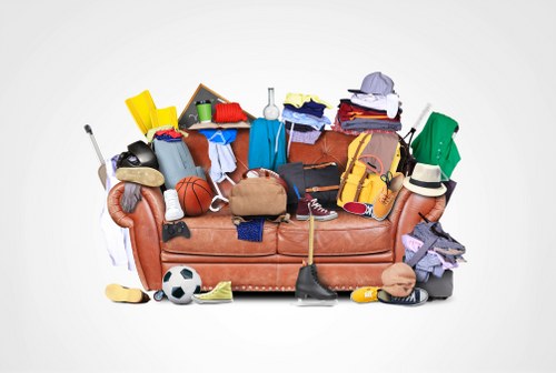 Flat clearance team removing furniture from a Yiewsley flat