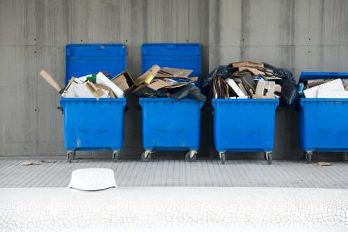Vans lined up outside a commercial property in Yiewsley for waste removal