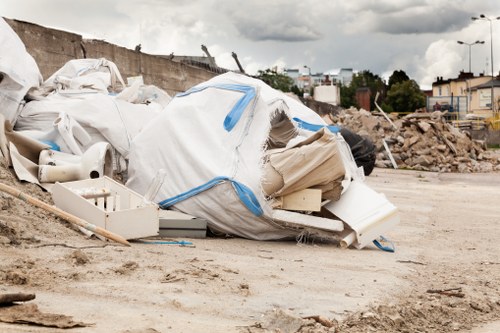 Construction site with organized waste clearance in Yiewsley